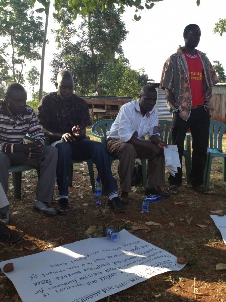 Community researchers exploring governance issues in Uganda