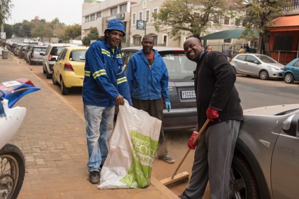 Volunteers in South Africa contribute to a community clean up project by GEM.