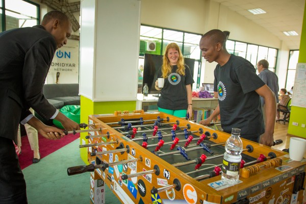 Team members from Children Engagement for Government Accountability play a match between sessions