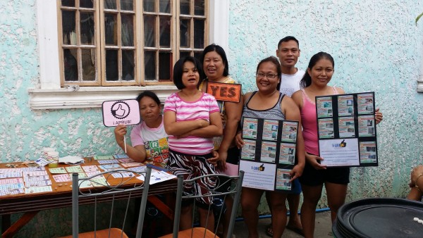 The Check My Barangay team went door to door to ask citizens to vote for their preferred projects. Photo: ANSA-EAP